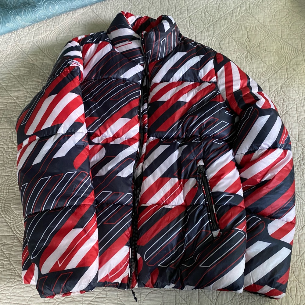 Men’s large puffer coat new with tags.